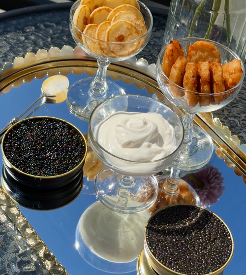 Caviar with blinis and creme fraiche